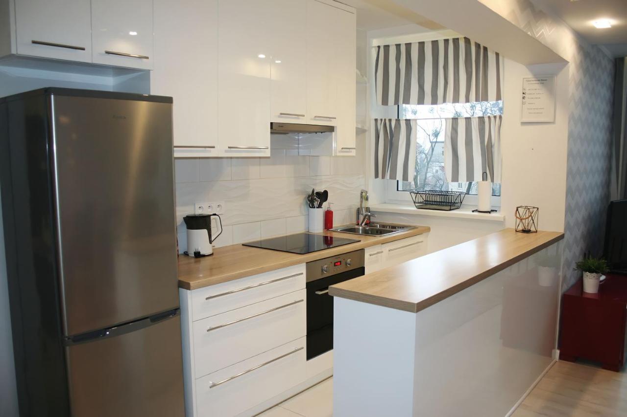 Apartament Rosso Apartment Torun Bagian luar foto