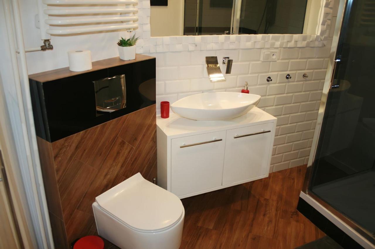 Apartament Rosso Apartment Torun Bagian luar foto